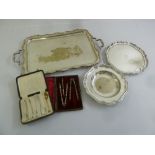 A quantity of silver plate to include a tea tray and a cased set of nut crackers