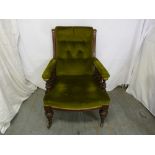 Edwardian mahogany armchair, button back with turned supports for the arms on baluster legs with