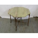 A 1970s octagonal marble occasional table on simulated metal bamboo legs