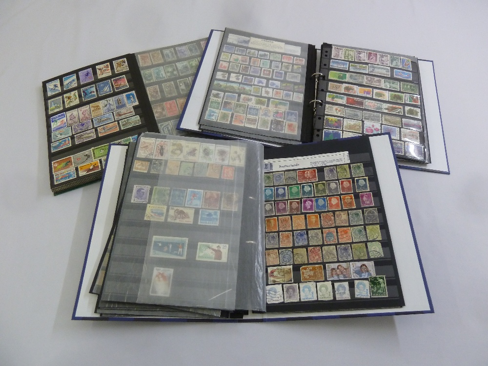 Three albums of foreign stamps to include Italy, Poland, Russia, Norway, Sweden, USA, Canada and