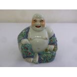 Chinese polychromatic ceramic figurine of seated Buddha, marks to the base, 26cm (h)