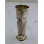 A Victorian silver vase, tapering cylindrical part fluted on raised circular base, London 1885