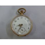 14ct yellow gold open face pocket watch with Arabic numerals and subsidiary seconds dial, approx