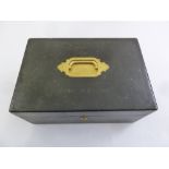 A rectangular leather bound stationery box with fitted leather interior, circa 1880 made for the