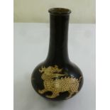 A Chinese early 20th century black glazed vase decorated with dragons