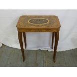A rectangular occasional table with inlaid decoration and musical movement on four cabriole legs