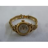 Gold ladies wristwatch with integral bracelet, tested 18ct, approx total weight 24.1g