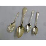 A silver caddy spoon, fiddle pattern silver dessert spoons and two Georgian silver tea spoons