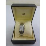 A Dunhill Facet gentlemans stainless steel wristwatch with Arabic numerals, in original packaging