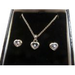 Chopard ladies 18ct white gold heart shaped floating diamond necklace and matching earrings