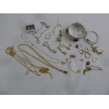 A quantity of costume jewellery to include rings, earrings, bangles, bracelets and necklaces