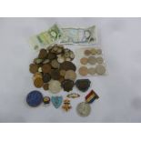 A quantity of GB and foreign coins, badges , a £5 Gill banknote and a £1 Somerset bank note
