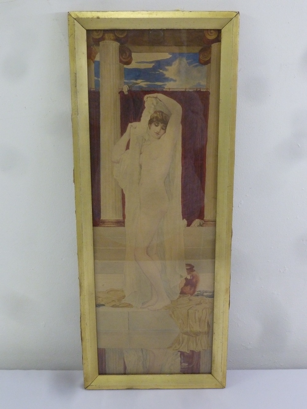 A framed and glazed watercolour of a classical nude in the style of Alma-Tadema, 71 x 24cm