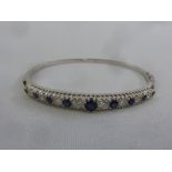 18ct white gold bangle set with sapphires and diamonds, approx total weight 15.5g