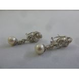 A pair of 18ct white gold diamond and pearl earrings, approx total weight 9.8g