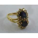 18ct gold sapphire and diamond crossover ring, approx total weight 6.1g