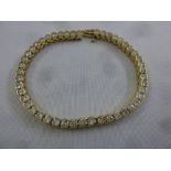 9ct yellow gold and diamond line bracelet, approx total weight 14.6g