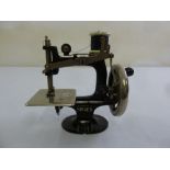 Childrens Singer sewing machine of customary form