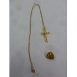 9ct gold Crucifix on 9ct gold chain and a 9ct gold brooch, approx total weight 3.9g