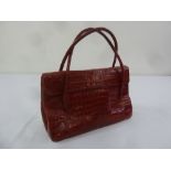 Nancy Gonzalez red stained crocodile ladies handbag