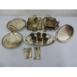 A quantity of silver plate to include trays, tea glass holders and flatware