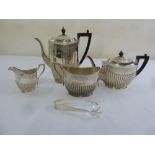 A silver plated four piece teaset, part fluted with angled handles