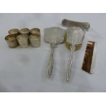 A quantity of silver to include six napkin rings and a brush, hand mirror and comb set with silver