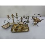 A quantity of silver plate to include candelabra, a tray, a teaset, kettle on stand and a dish