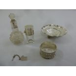 A quantity of silver and white metal to include two perfume bottles with silver collars, a napkin