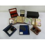 A quantity of bridge accessories to include sets of cards, two Asprey leather bridge boxes and cased
