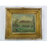 A framed oil on board of a large house and garden, stamped for Prague on the verso, signed bottom
