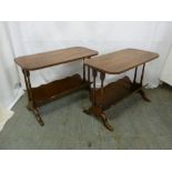 A pair of Bevan Funnel rounded rectangular side tables with magazine racks to bases