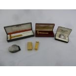 A quantity of mens accessories to include a Gillette gold plated razor, a Prince Prona lighter, a