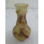 A Victorian yellow matt baluster vase decorated with coloured swirls