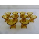 A set of ten amber pressed glass ice cream bowls, circa 1920