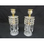 A pair of Victorian crystal lustres to include spare drops