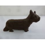 A Meissen Botter Steinzeug unglazed figurine of a dog, marks to the base