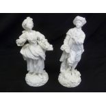 A pair of blanc de chine figurines of a flower seller and a fisherman, marks to the bases, A/F