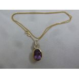 9ct yellow gold amethyst and white topaz pendant on a 9ct gold chain, approx total weight 5.3g