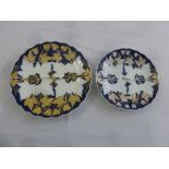 Two Meissen mid 19th century plates decorated with flowers and leaves, marks to the bases