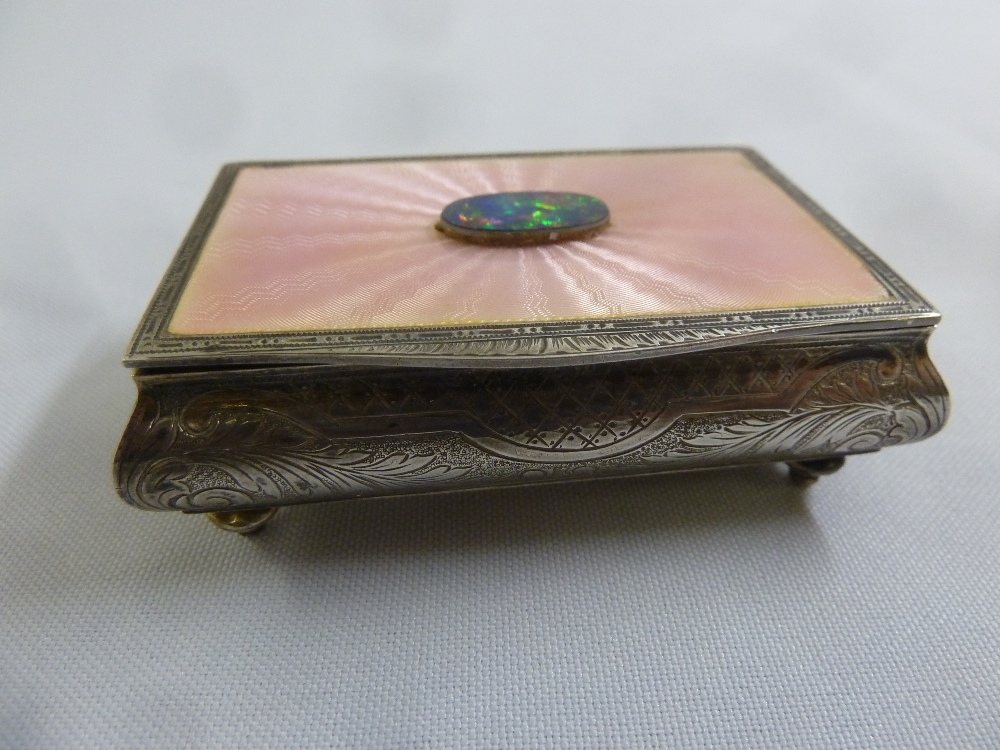 A continental white metal and enamel jewellery casket with hinged cover on four ball feet, A/F