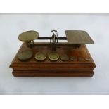 Early 20th century postal scale and brass weights