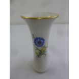 A Meissen waisted form vase decorated with flowers and gilded border, marks to the base