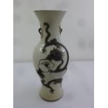A large Chinese crackle glazed baluster vase decorated with applied dragons chasing a flaming pearl,