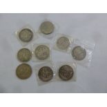 A quantity of silver coins to include crowns and dollars, approx total weight 243g