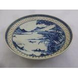 A Chinese Qianlong blue and white dish with pierced sides and images of a landscape, marks to the