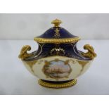 A 19th century Coalport covered vase decorated with hand painted panels, marks to the base