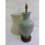 A Chinese celadon baluster form table lamp and shade