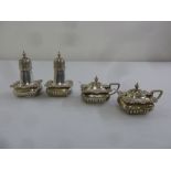 Silver four piece condiment set to include two condiment spoons