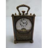 A Continental miniature silver plated carriage clock, enamel dial and Roman numerals, A/F